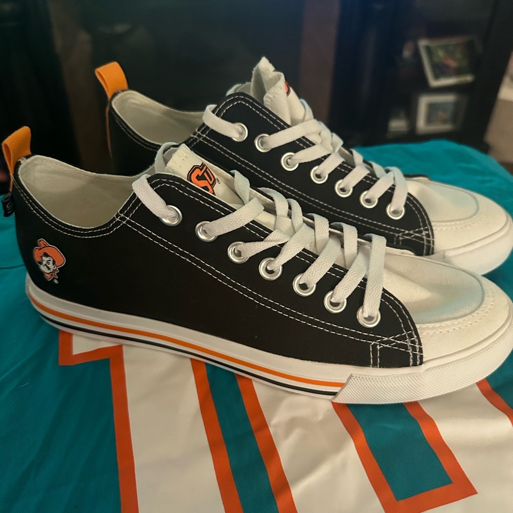 Black and White Low-Top Sneakers with Orange Accents